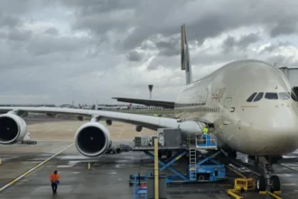 Archive Etihad Airbus A380 A6-APJ parked at a London Heathrow gate in January 2026.