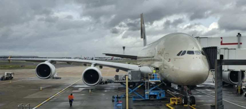 Archive Etihad Airbus A380 A6-APJ parked at a London Heathrow gate in January 2026.