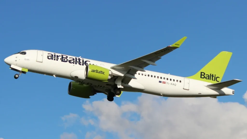 Archive airBaltic Airbus A220-300 YL-AAQ in flight, photographed in December 2019.