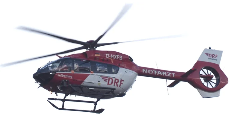 Archive DRF Luftrettung H145 D-HXFB in flight, showing the five-bladed rotor and enclosed tail rotor.