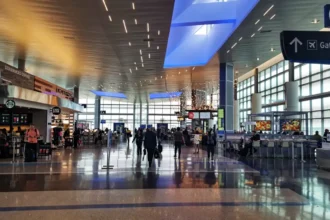 Archive: IAH airport concourse with C6 signs, photographed in February 2020.