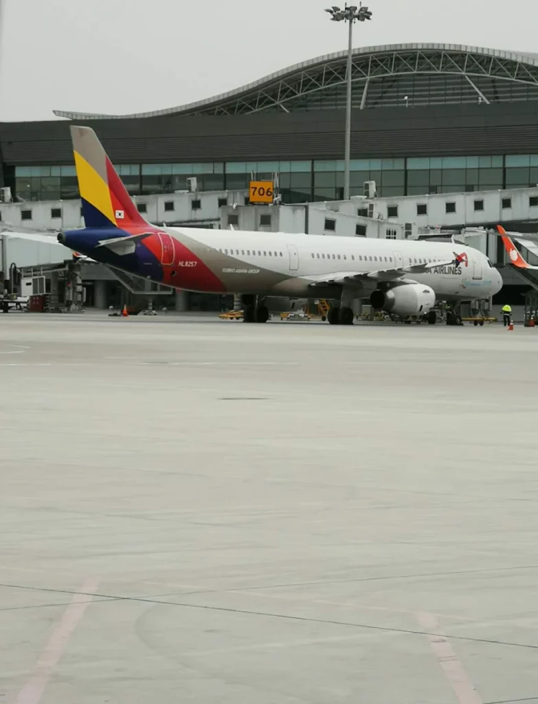 Archive Asiana Airlines Airbus A321 parked at Xi’an in December 2018; not a current flight.