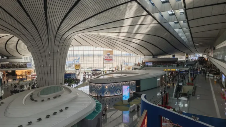 Curved terminal roof and passenger concourses inside Beijing Daxing International Airport