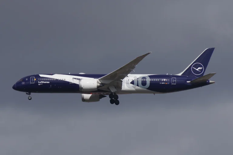 Lufthansa Boeing 787-9 D-ABPU in centenary livery approaching Berlin Brandenburg with landing gear extended