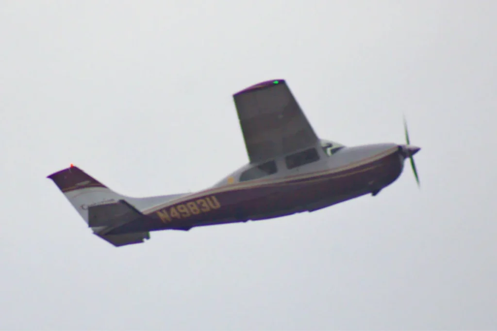 Archive Cessna 210N N4983U in flight at Daytona Beach, a different aircraft from VH-RDH