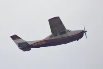 Archive Cessna 210N N4983U in flight at Daytona Beach, a different aircraft from VH-RDH