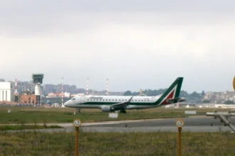 Archive Alitalia aircraft at Naples airport on June 16, 2014; not flydubai or current runway works.