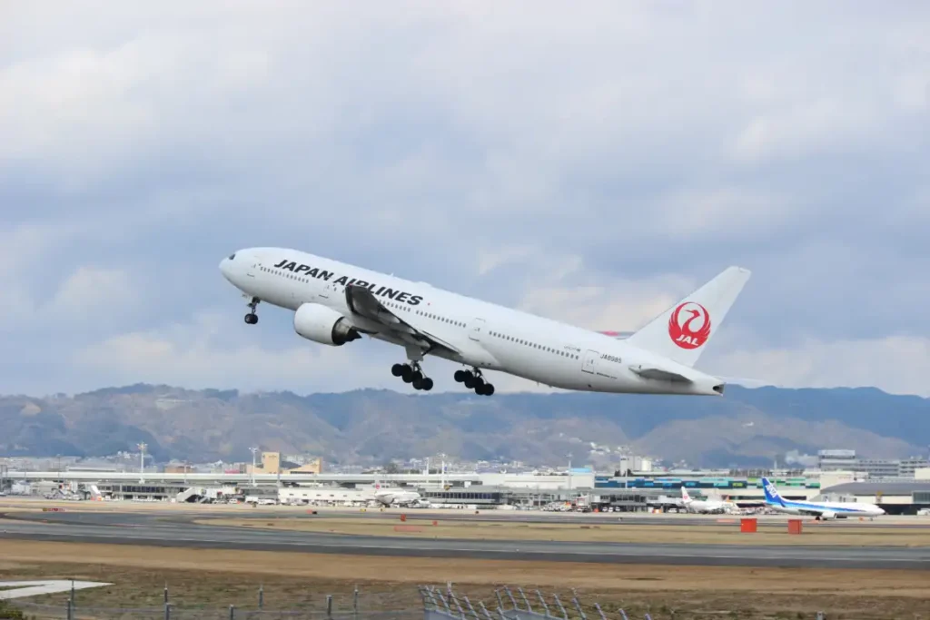 Archive Japan Airlines Boeing 777-200 JA8985 taking off from Osaka in March 2019