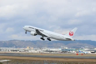Archive Japan Airlines Boeing 777-200 JA8985 taking off from Osaka in March 2019