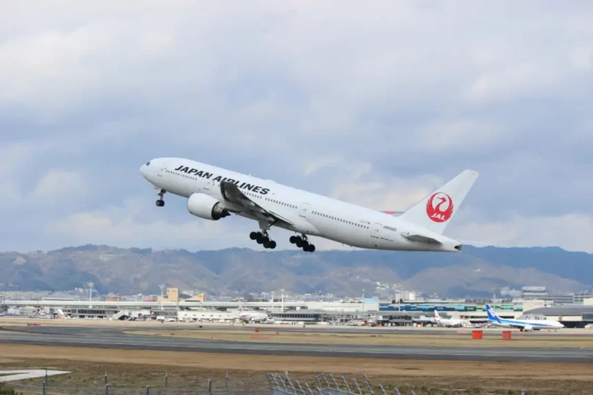 Archive Japan Airlines Boeing 777-200 JA8985 taking off from Osaka in March 2019