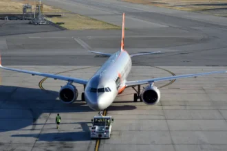 Archive view of a Jetstar Airbus A321neo with a ground tug at Perth Airport in May 2025.