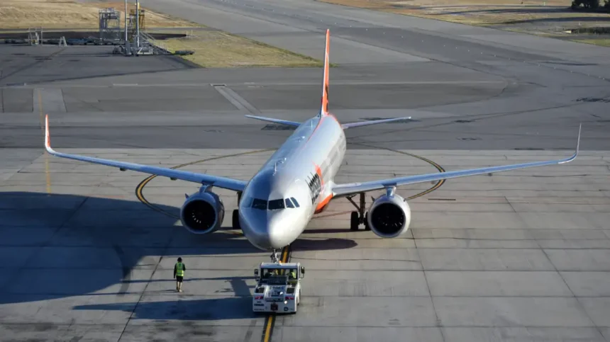 Archive view of a Jetstar Airbus A321neo with a ground tug at Perth Airport in May 2025.