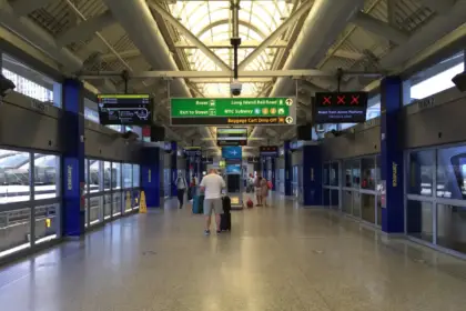 Travelers at Jamaica AirTrain JFK station in a June 2021 archive photograph