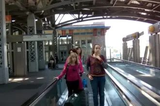 Travelers at Jamaica AirTrain JFK station in a June 2015 archive photograph