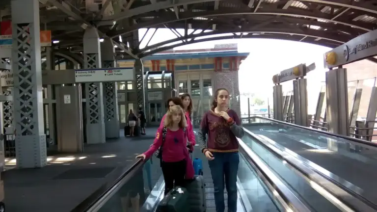 Travelers at Jamaica AirTrain JFK station in a June 2015 archive photograph