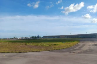 Archive view of Krabi Airport terminal and apron in Thailand, August 2024; general airport context, not September 2026 traffic evidence.