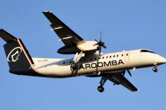 Maroomba Airlines DHC-8-311 VH-QQN approaching Perth with landing gear extended