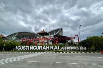 Archive view of the terminal and I Gusti Ngurah Rai Airport welcome sign in Bali, August 2022