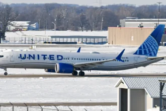 United Airlines Boeing 737 MAX 9 parked at an Indianapolis airport gate