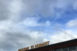 Welcome to Hobart sign on the airport terminal in August 2015