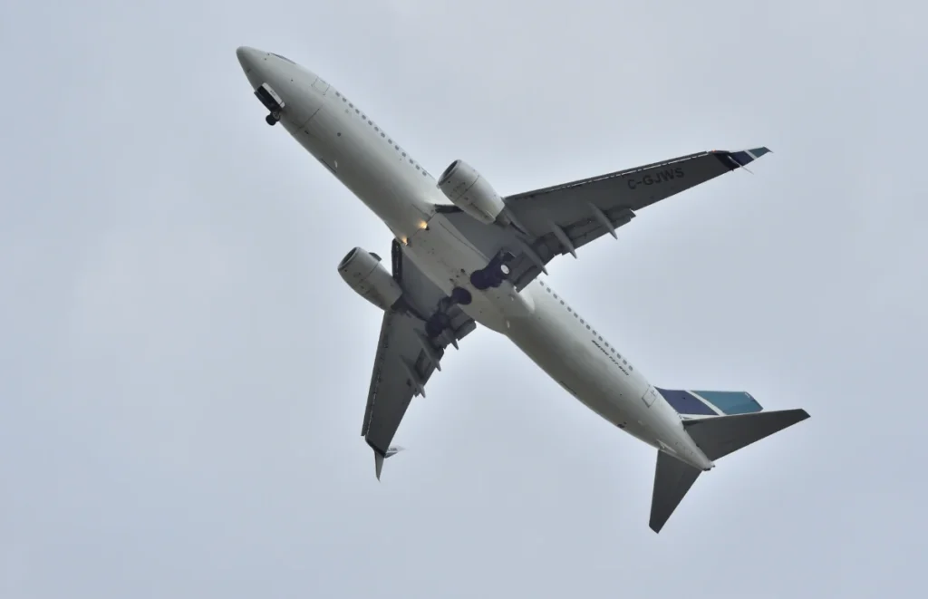 Archive WestJet Boeing 737-800 climbing after departure from Toronto Pearson Airport in July 2017