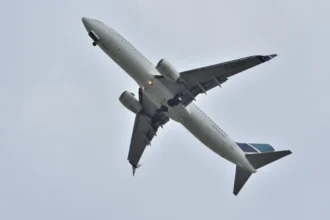 Archive WestJet Boeing 737-800 climbing after departure from Toronto Pearson Airport in July 2017