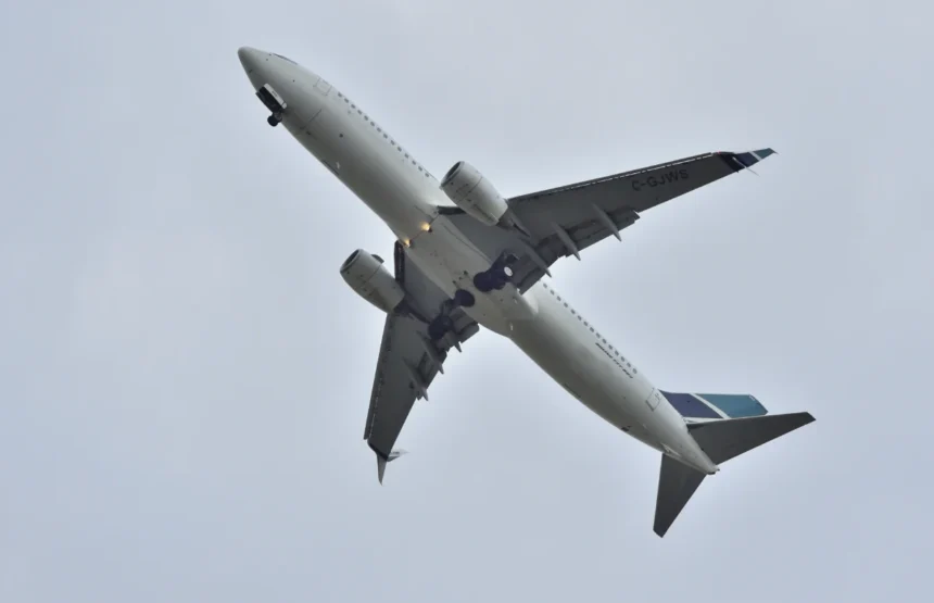 Archive WestJet Boeing 737-800 climbing after departure from Toronto Pearson Airport in July 2017